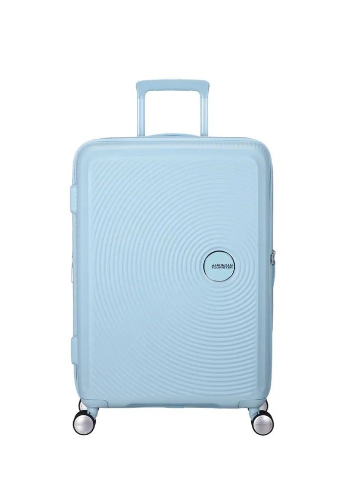 Maleta mediana Soundbox American Tourister en color azul pastel, vista principal