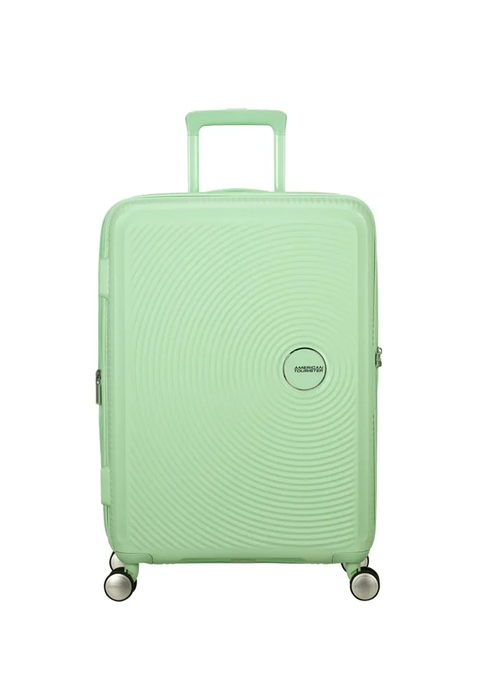 Maleta mediana Soundbox American Tourister en color verde pastel, vista principal