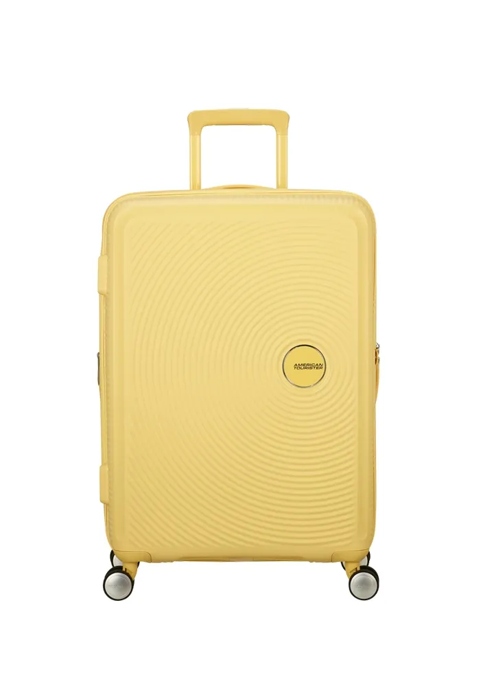 Maleta mediana Soundbox American Tourister en color amarillo pastel, vista principal