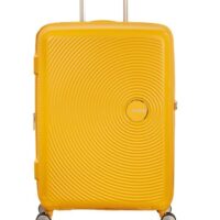 Maleta grande Soundbox American Tourister en color amarillo, vista frontal, carcasa rígida, ruedas 360° y diseño resistente
